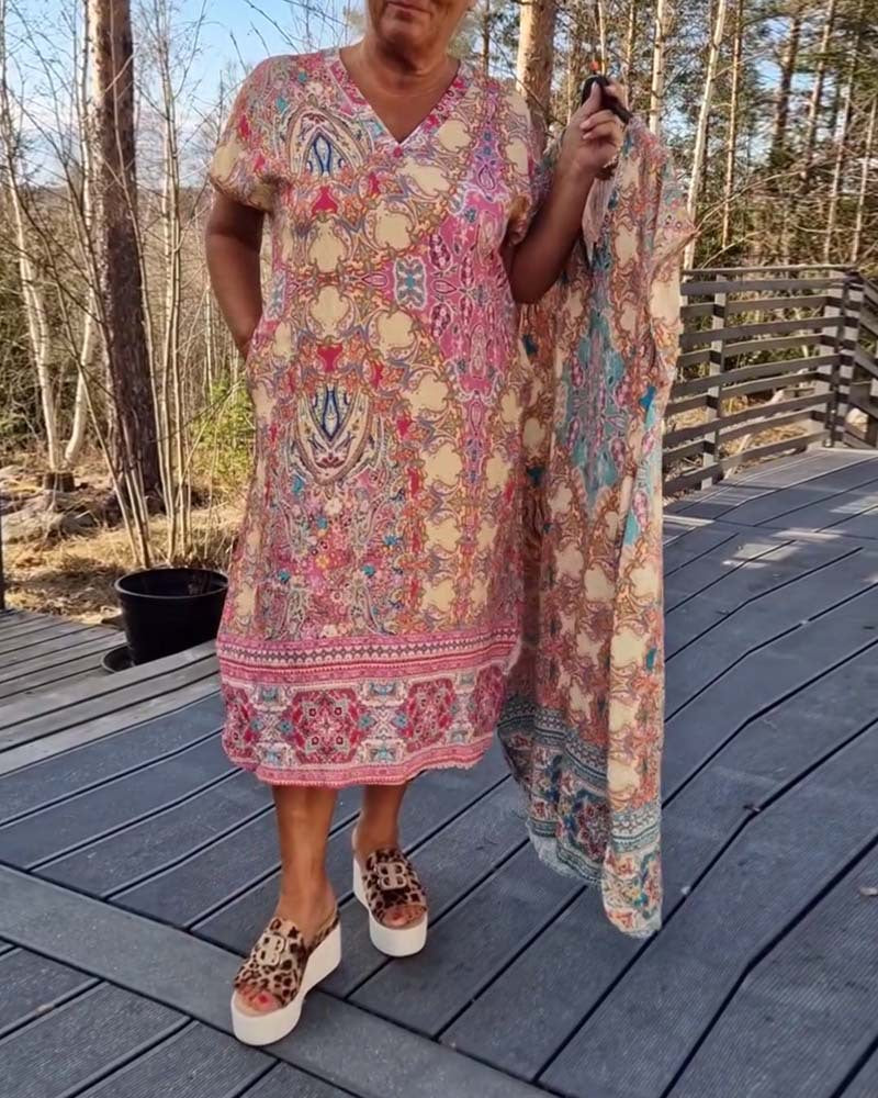Dame nan flydende midikjole i tunika-kaftan-mix med V-udskæring, korte ærmer, løstsiddende pasform og matchende pareo Skovae