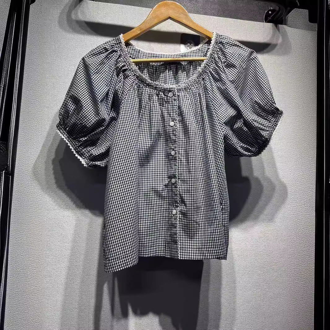 Damebluse med puffærmer og ternet mønster Stilla