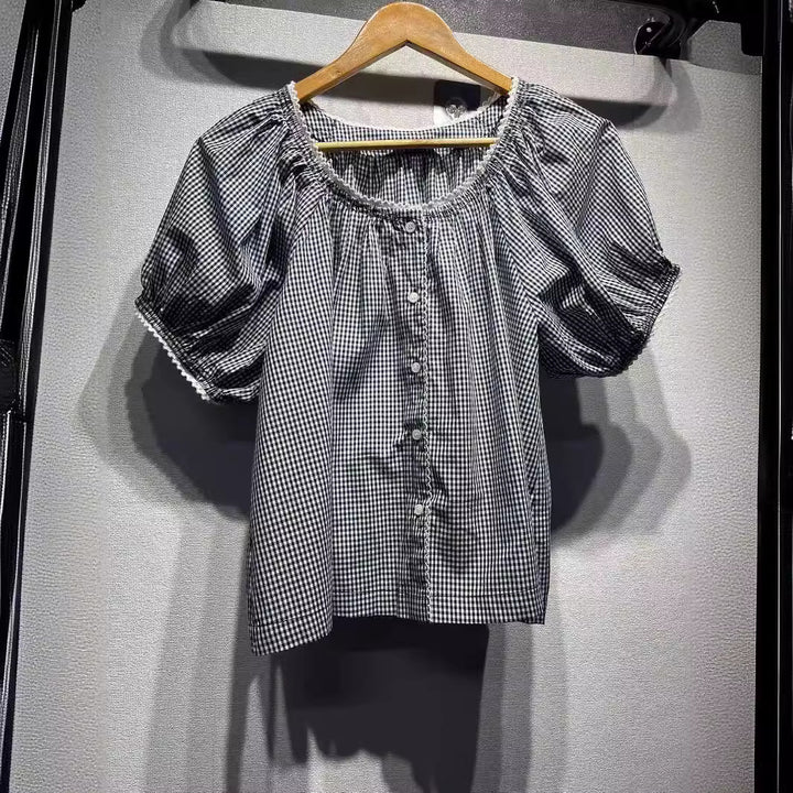 Damebluse med puffærmer og ternet mønster Stilla