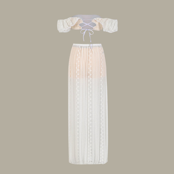 Dame to-delt med elegant bandeau-overdel og gennemsigtig maxi-nederdel Stilla