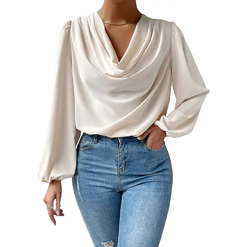 Damebluse med elegant drapering Stilla
