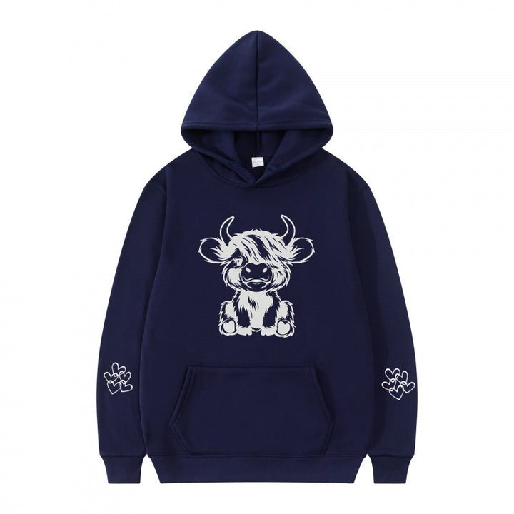 Kvindernes hætte sweatshirt med charmerende kvægmotiv og praktiske kængurulommer Skovae