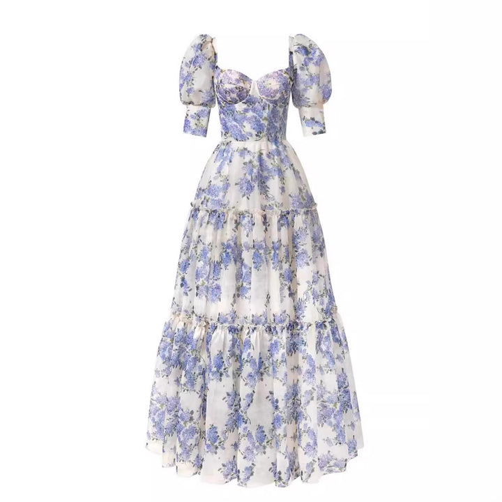 Kvindernes elegante maxikjole med off-the-shoulder flæseærmer og blomsterdetaljer