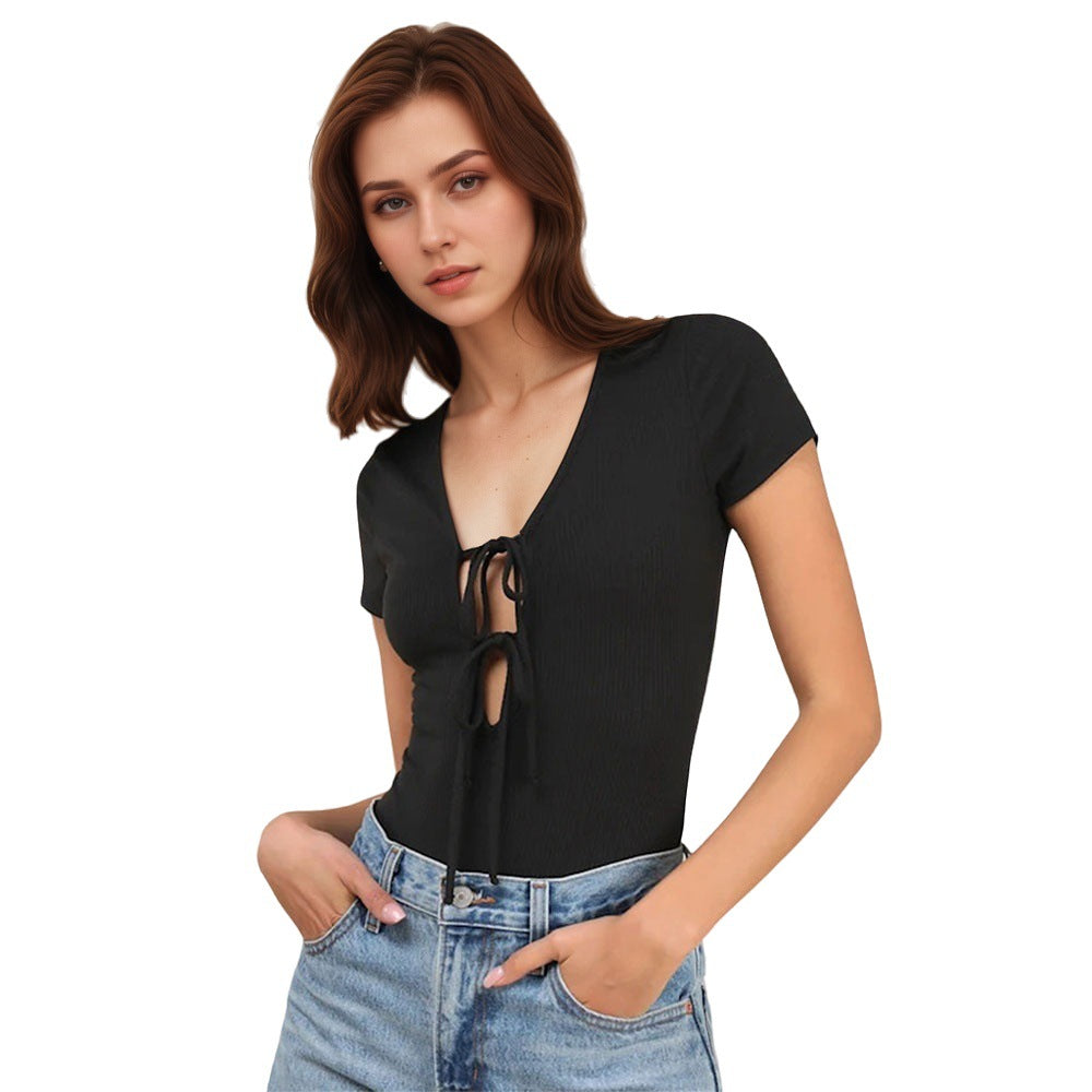 Kvinders bodysuit med fashionable V-hals og bånddetalje Stilla