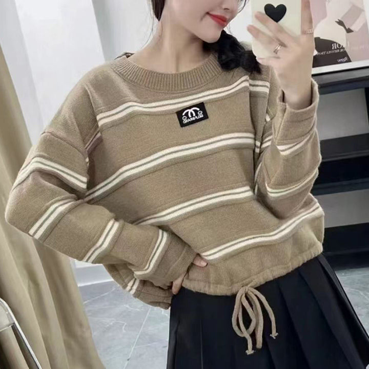 Kvinders stribede sweater med stilfuld snoretræk og afslappet oversized pasform