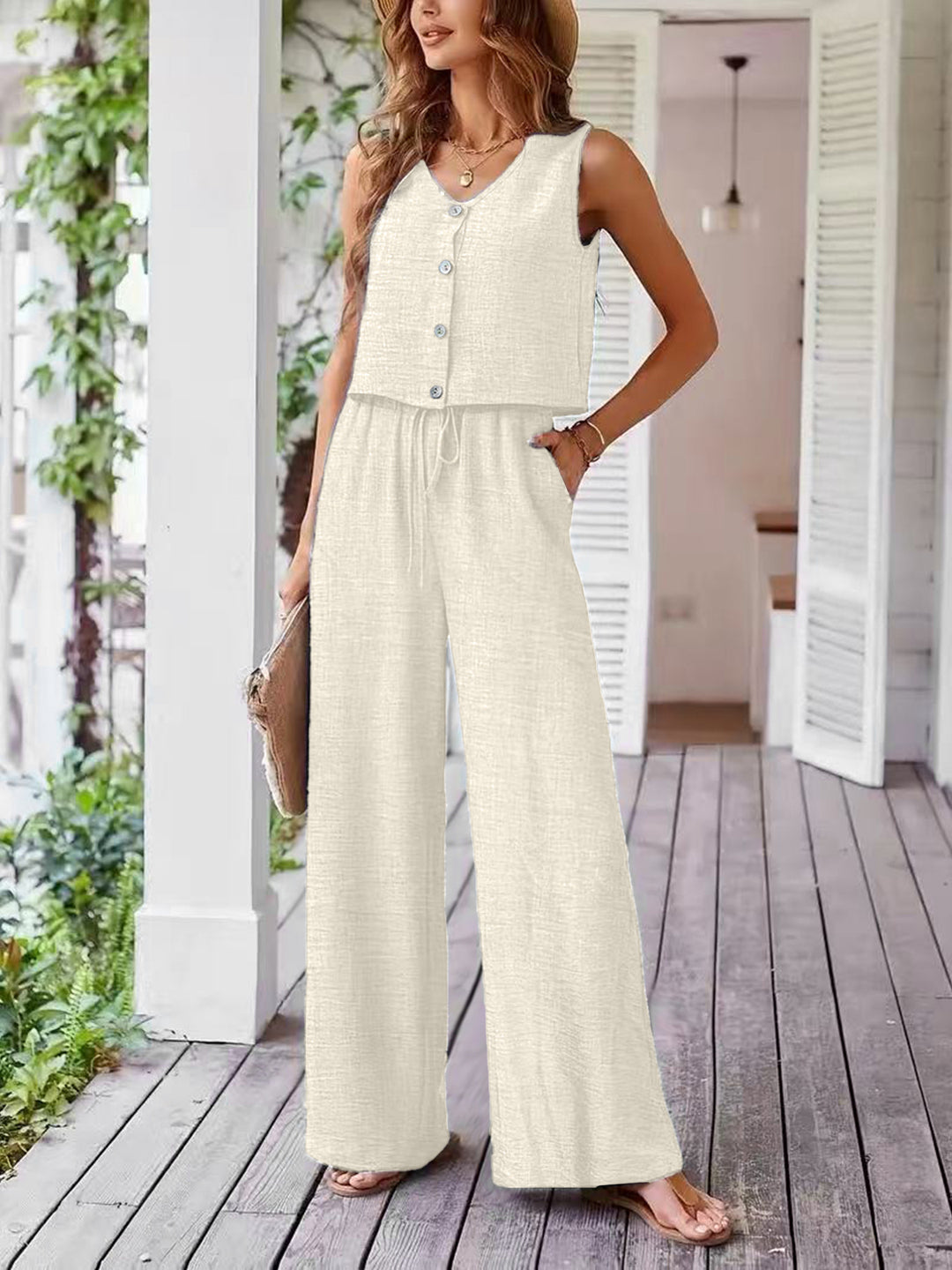 Dame leger jumpsuit med knaplukning og bredt ben Stilla