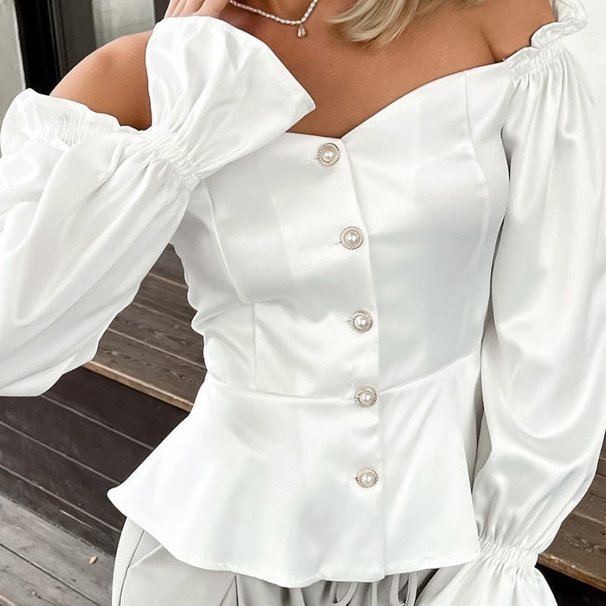 Dame Off-Shoulder Bluse med Puffærmer og elegant Knapliste Stilla