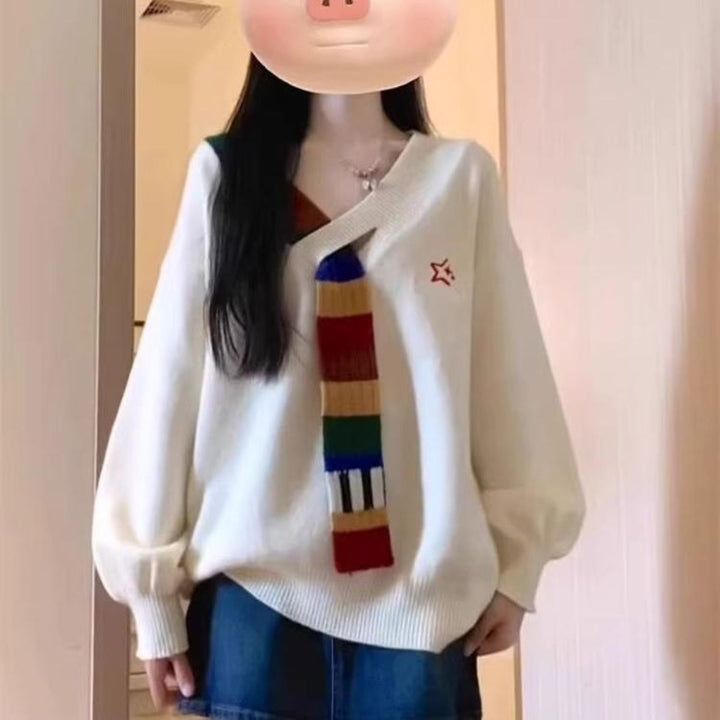 Kvinders stilfulde sweater med V-hals og farverige striber Stilla
