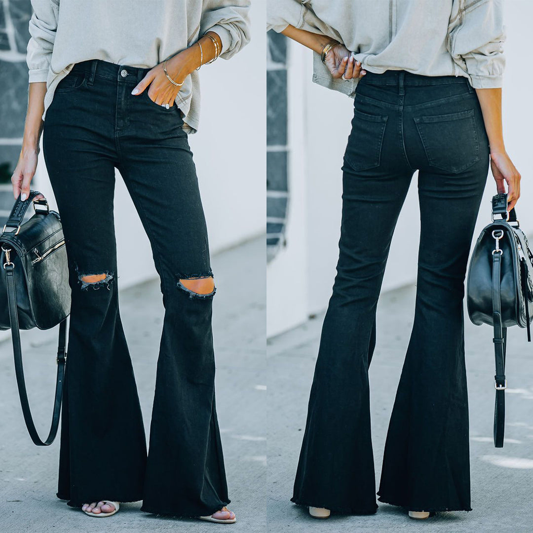 Damejeans i det trendy flared-snit med afslappede ripped-detaljer Stilla