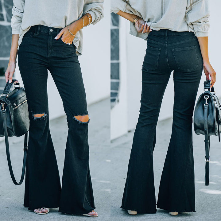 Damejeans i det trendy flared-snit med afslappede ripped-detaljer Stilla