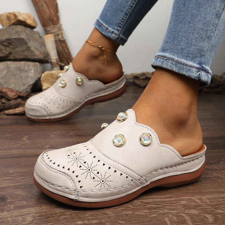 Dame Slip-On Clogs med Modeperforering og Elegante Dekordetaljer Stilla