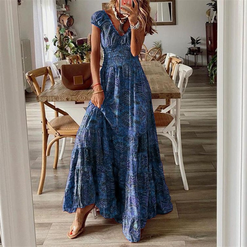 Dame maxikjole med dyb udskæring og elegante flæse detaljer Stilla