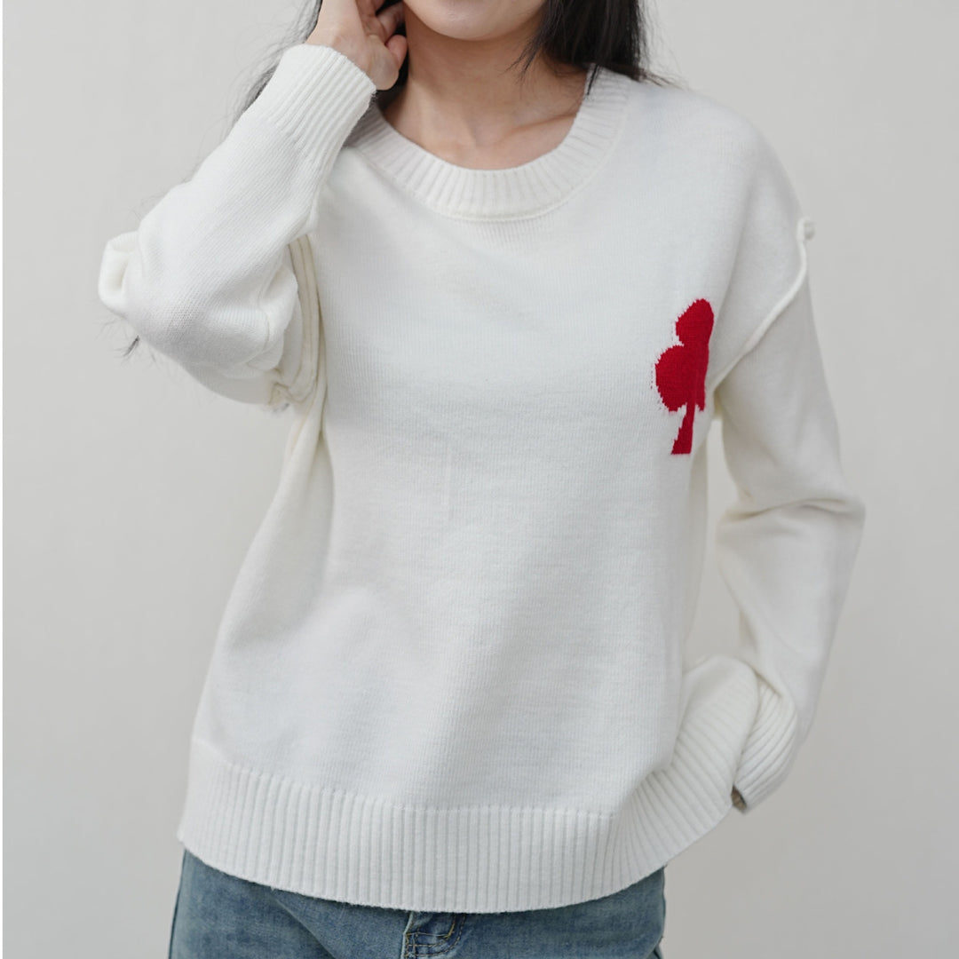Dame mønsteret kort sweater lavet af blødt strikmateriale med det ikoniske Stilla-logo