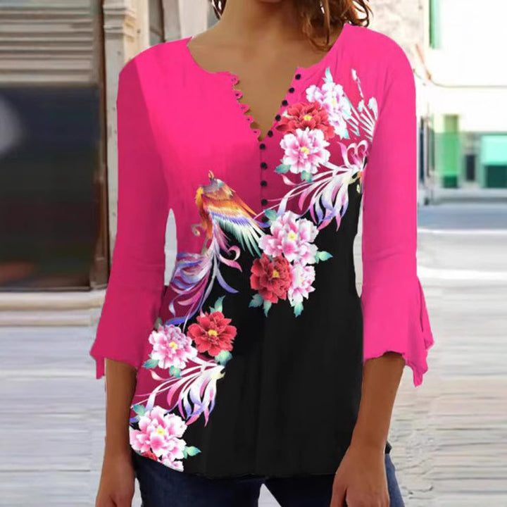 Damebluse med florale accenter og elegante knapdetaljer Stilla