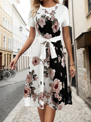 Damekjole med floral design og taljerbart bælte Stilla