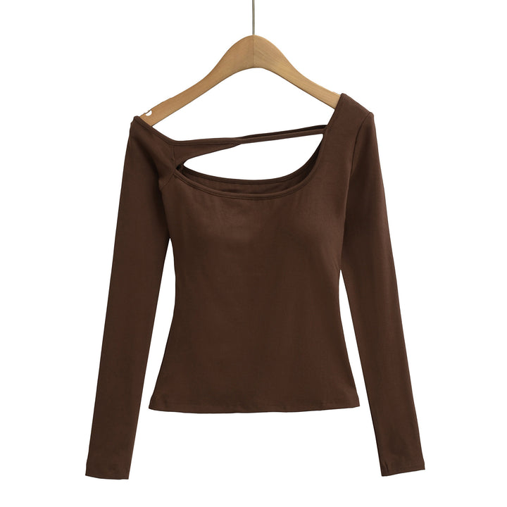 Dame langærmet top med innovativt cut-out-design og figursyet pasform Stilla