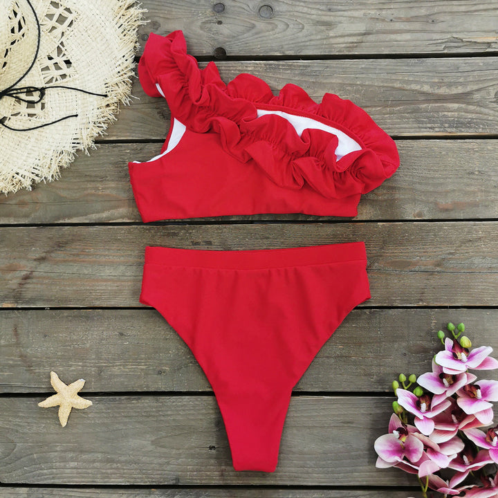 Dame bikini-sæt med asymmetrisk snit og voluminøse flæser Stilla