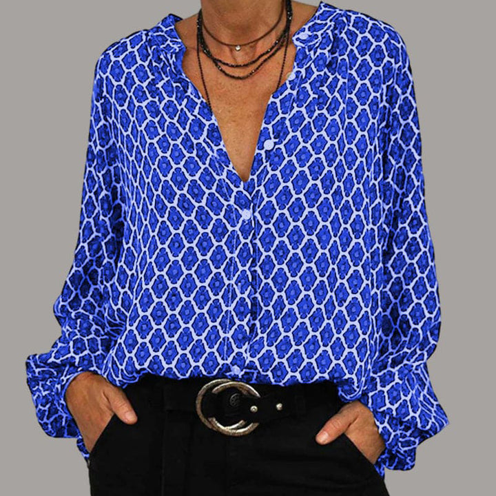 Damebluse med geometrisk tryk og moderne ståkrave Stilla