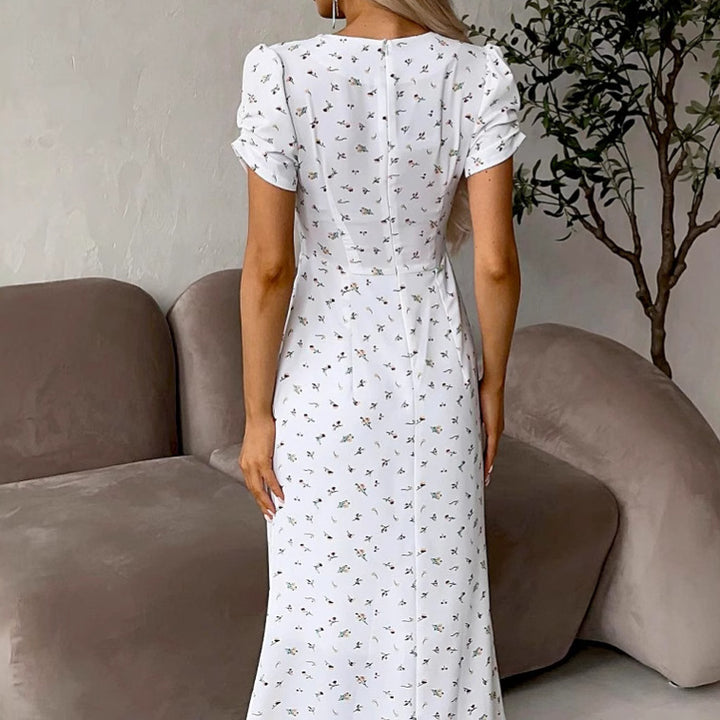 Dame Maxikjole med blomsterprint og puffærmede design Stilla