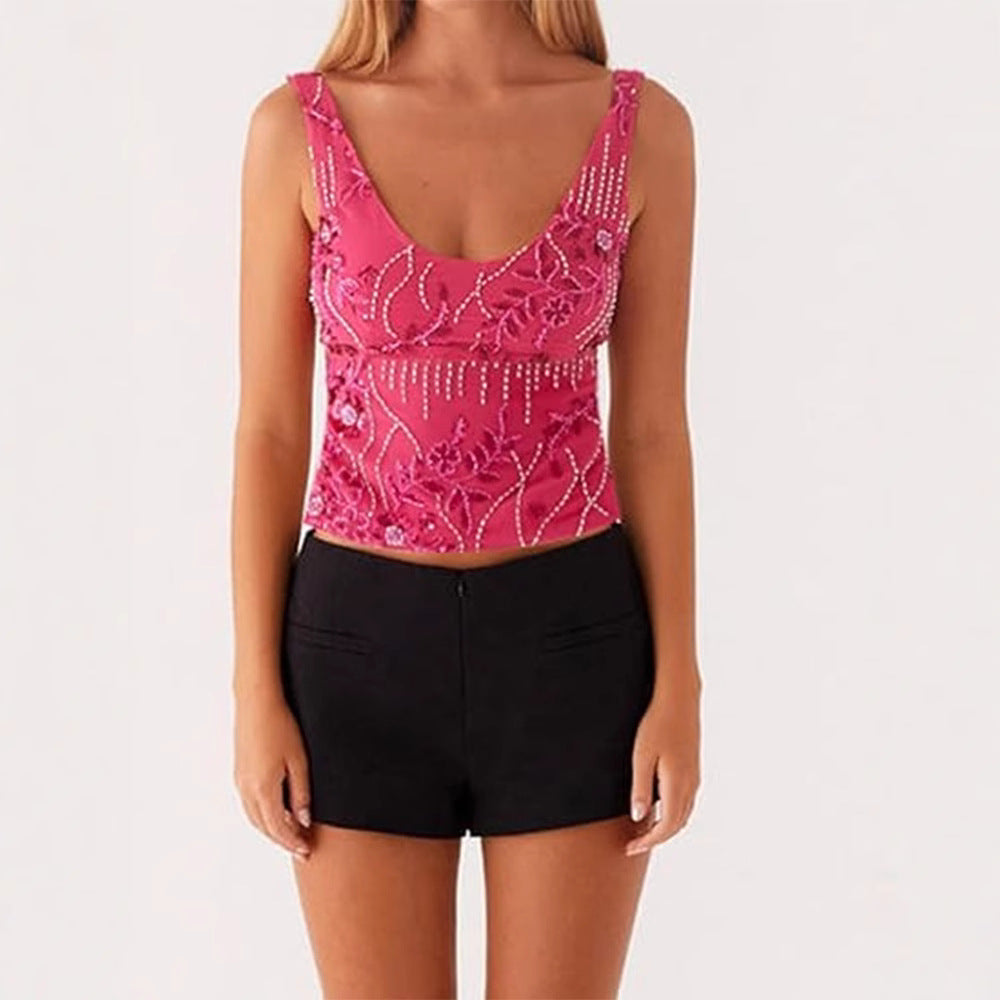 Dame couture top med floral rhinestone design og tætsiddende snit