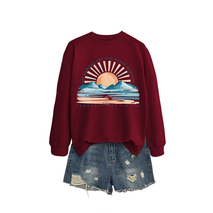 Dame sweatshirt med inspirerende solopgang design og afslappet pasform Stilla