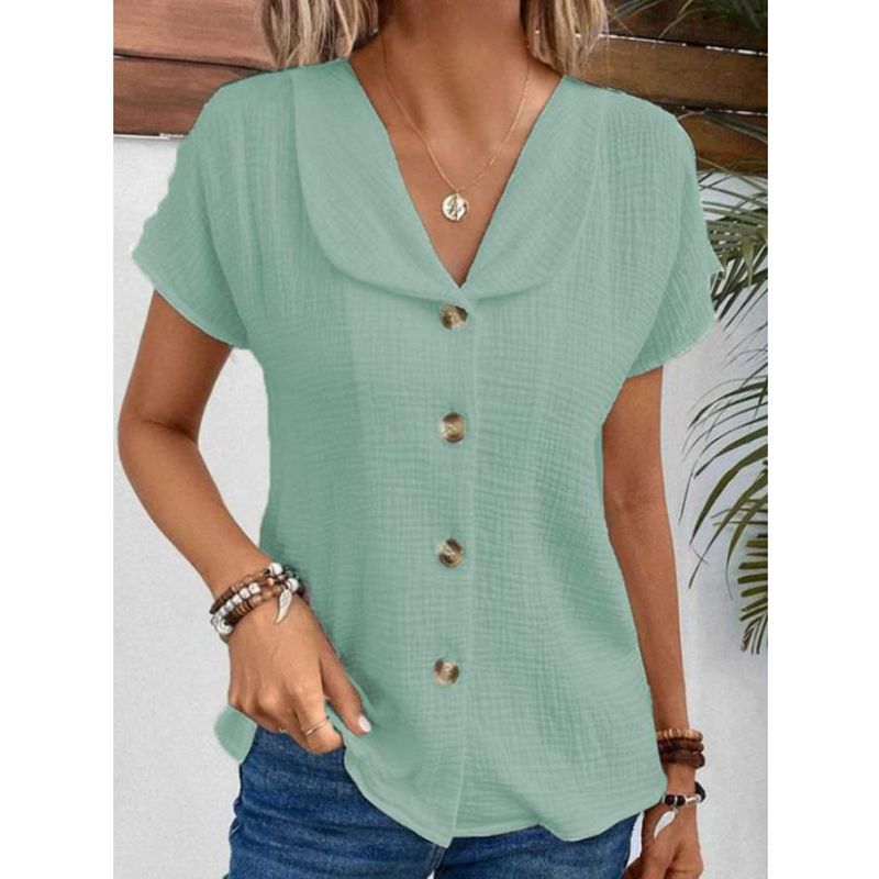 Damebluse med synlige knapper lavet af let stof Stilla