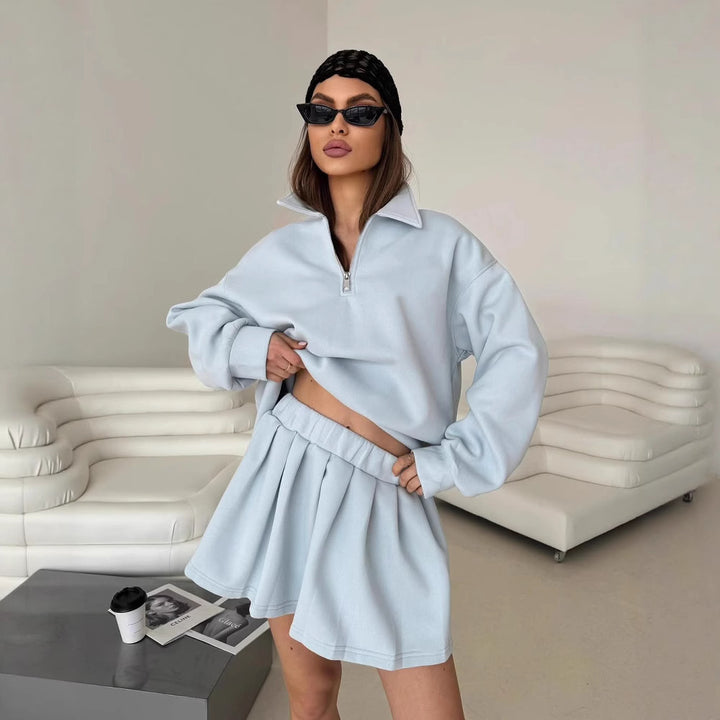 Dame sporty oversized pullover med kort lynlås og ribbede detaljer Skovae
