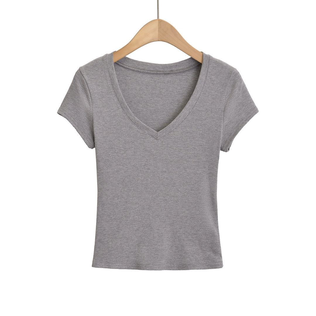 Dame cropped V-hals T-shirt i ribdesign med tætsiddende snit og korte ærmer Stilla
