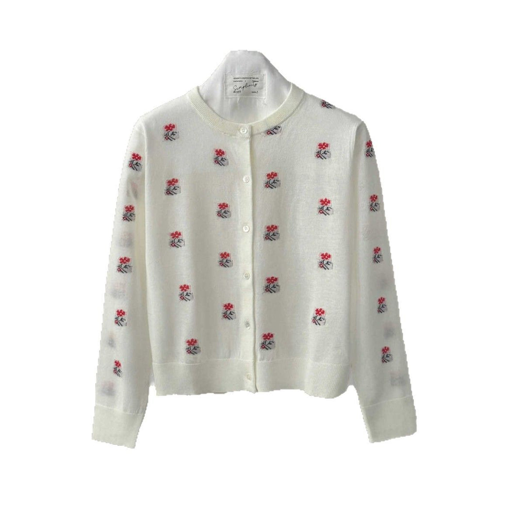 Dame strikjakke med fine broderidetaljer og elegant knapliste Stilla
