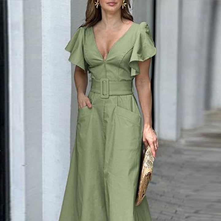 Dame maxikjole med elegante flæsedetaljer og praktiske lommer Stilla
