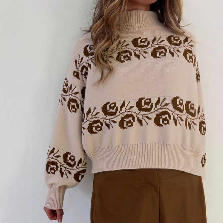 Kvinders strikket sweater med blomsteret jacquardmønster og høj krave Stilla