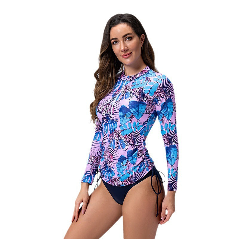 Damer Langærmet Rashguard med stilfuldt Flora-mønster og sidelommer med snore Skovae