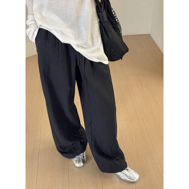 Dame bred stofbuks med elastisk talje og justerbar snor Stilla
