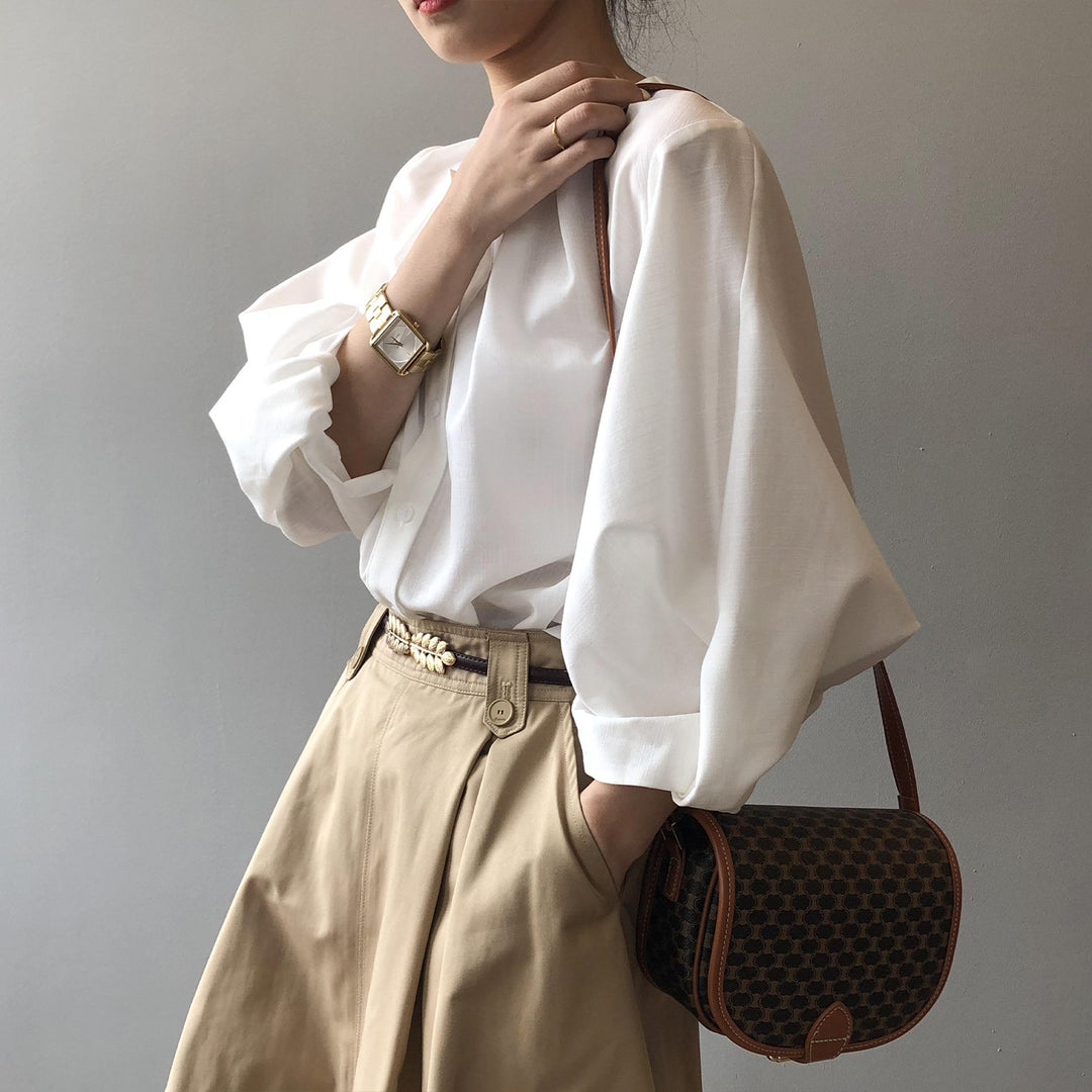 Dame bluse top med elegant knapdetaljer Stilla