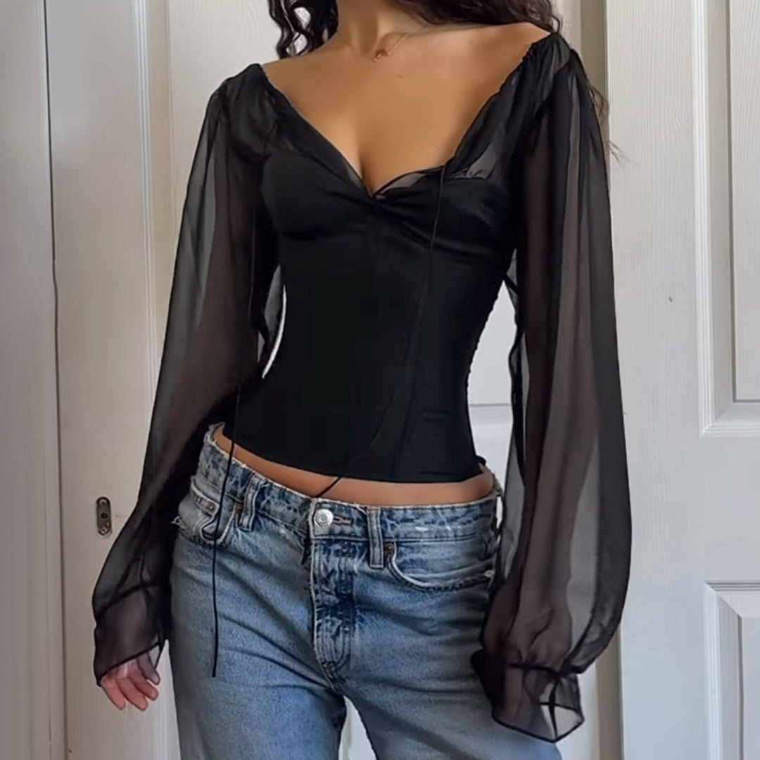 Dame elegant top med transparente ærmer og smal silhuet Skovae
