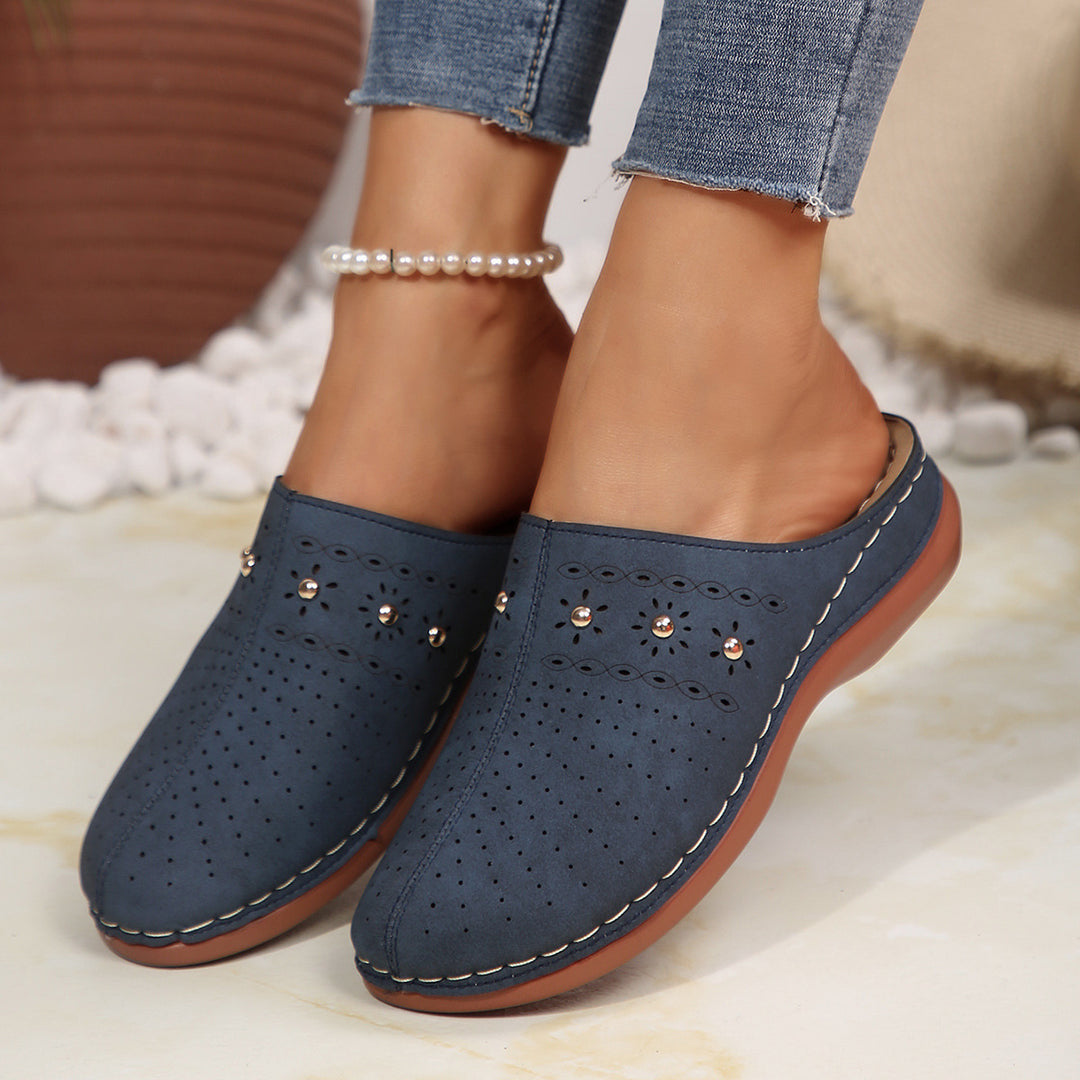 Dame Komfortable Clogs med fashionable perforeringsdesign og dekorative accenter Stilla