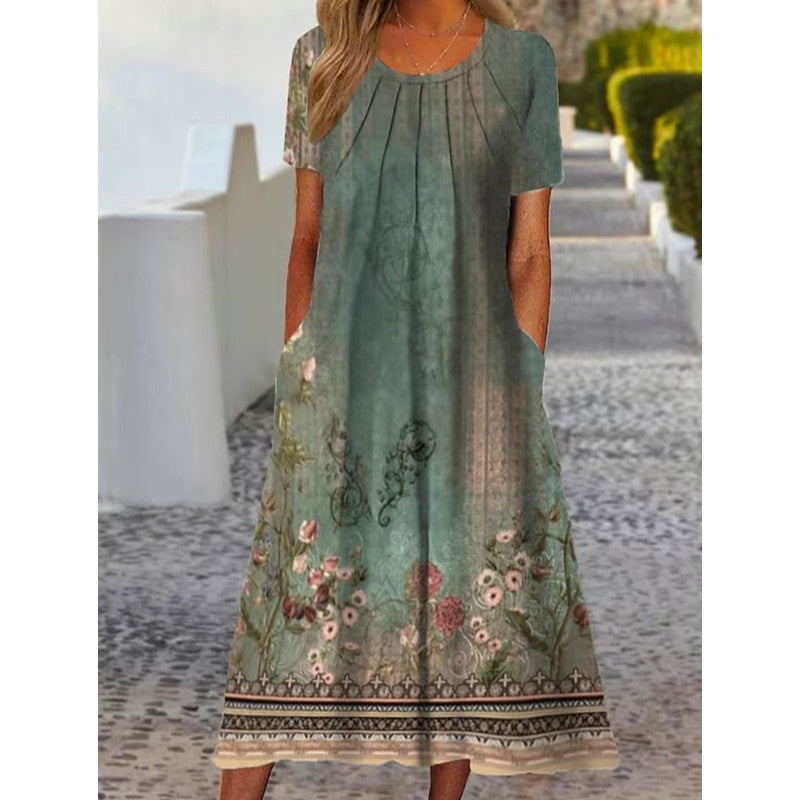 Dame sommerligt maxikjole med blomstret design og praktiske lommer Stilla
