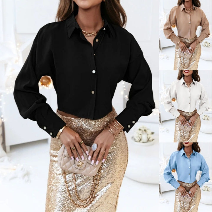 Dame Silke Bluse med elegante knapdetaljer og bredt skårede ærmer Stilla