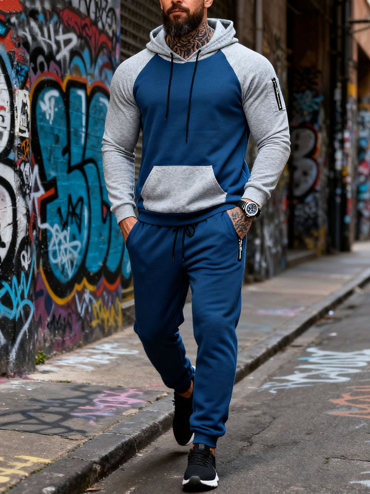 Herrer to-delt hætte-sweatset med raglanærmer, ærme-zip-lomme og tapered joggingbukser Skovae