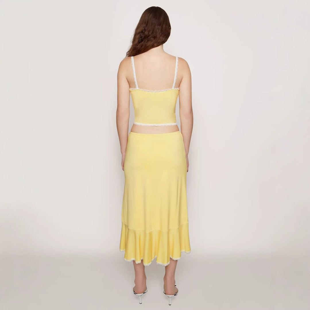 Dame sæt bestående af crop-top og svajende nederdel med spidsdetaljer Skovae