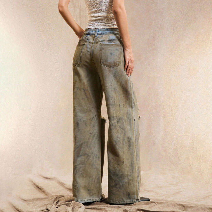 Kvindernes bredskårne jeans med slidte detaljer Stilla