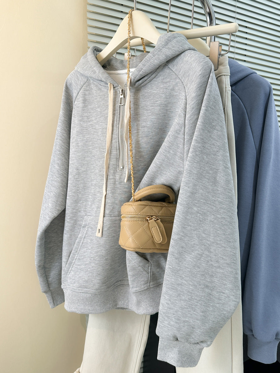Dame hoodie med lynlås og kængurulomme Stilla