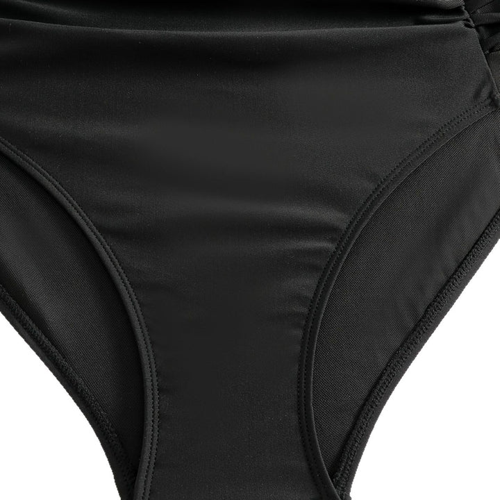 Dame Højskåret bikini med blomster accenter og raffinerede detaljer Skovae
