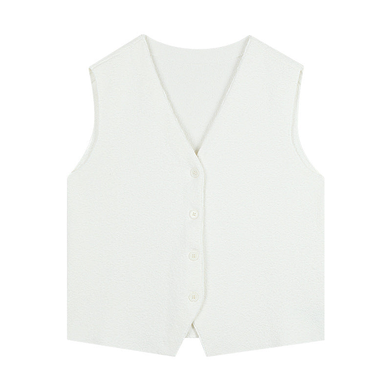 Dame elegant vest med fin tekstur og klassiske knapdetaljer Stilla