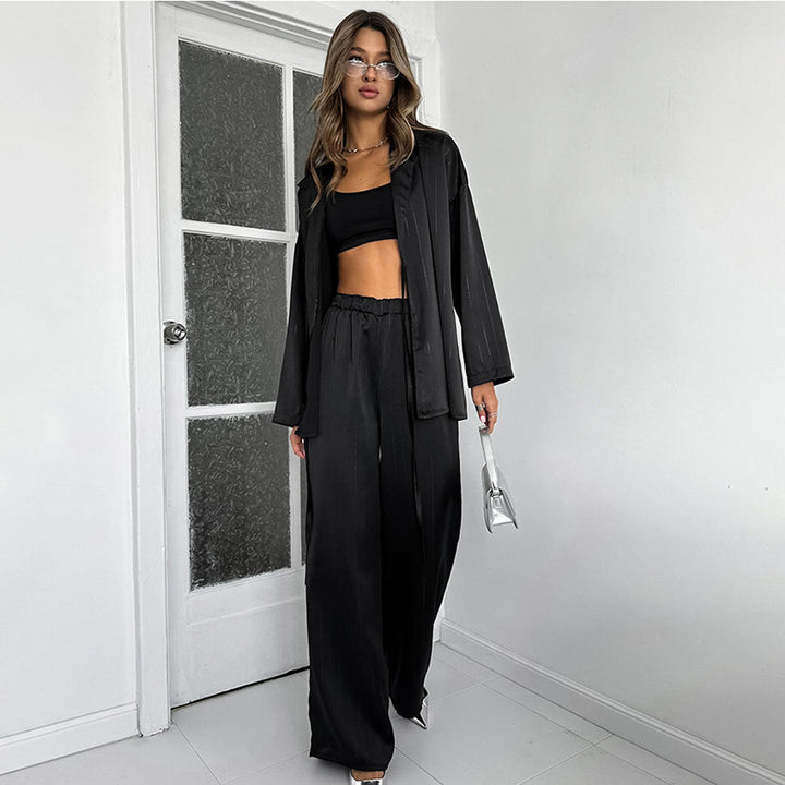 Dame jumpsuit med dyb V-udskæring og løs pasform Stilla