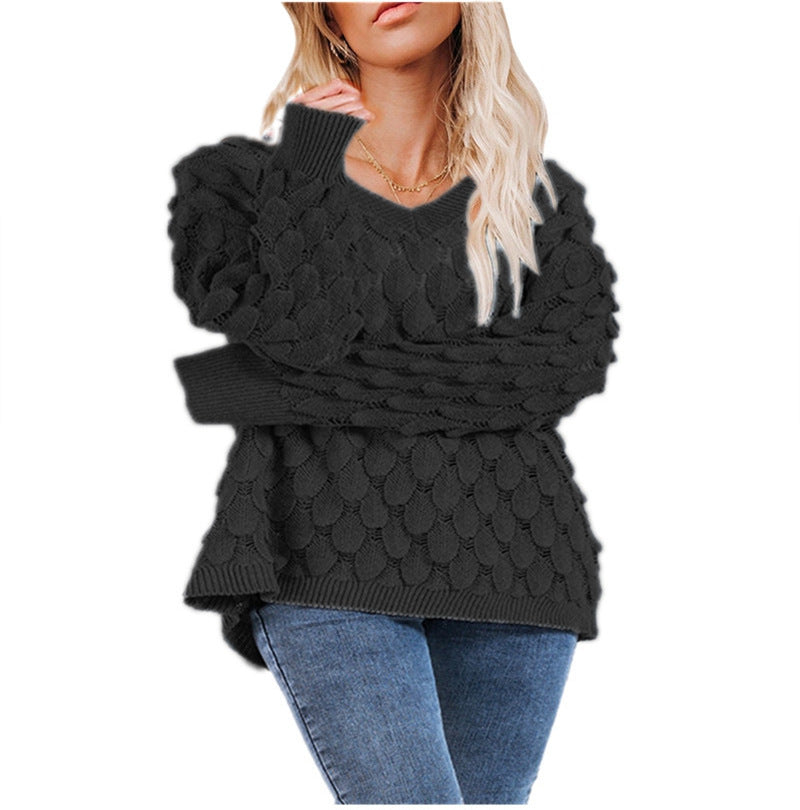 Kvinders chunky strikket sweater med skulpturel bølgemønster og V-hals Stilla