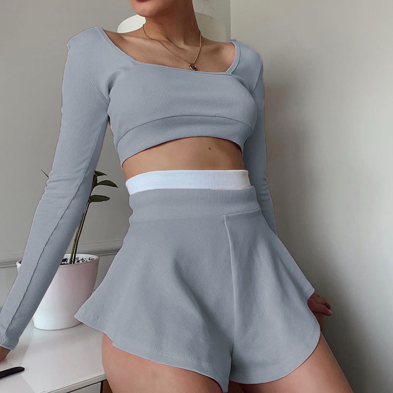 Dame smart Crop-Top med lange ærmer og svingende shorts Stilla