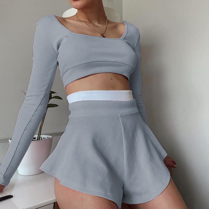 Dame smart Crop-Top med lange ærmer og svingende shorts Stilla
