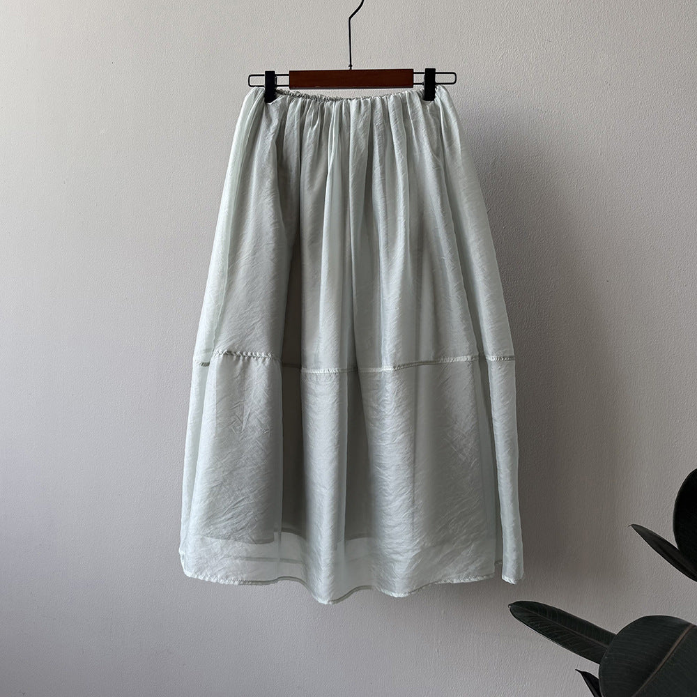 Dame Maxiskirt i let, åndbart materiale med elastisk talje og elegant snit Stilla