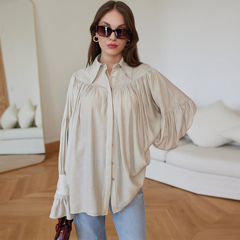 Dame oversized bluse med voluminøse ærmer og elegant knaplukning Stilla